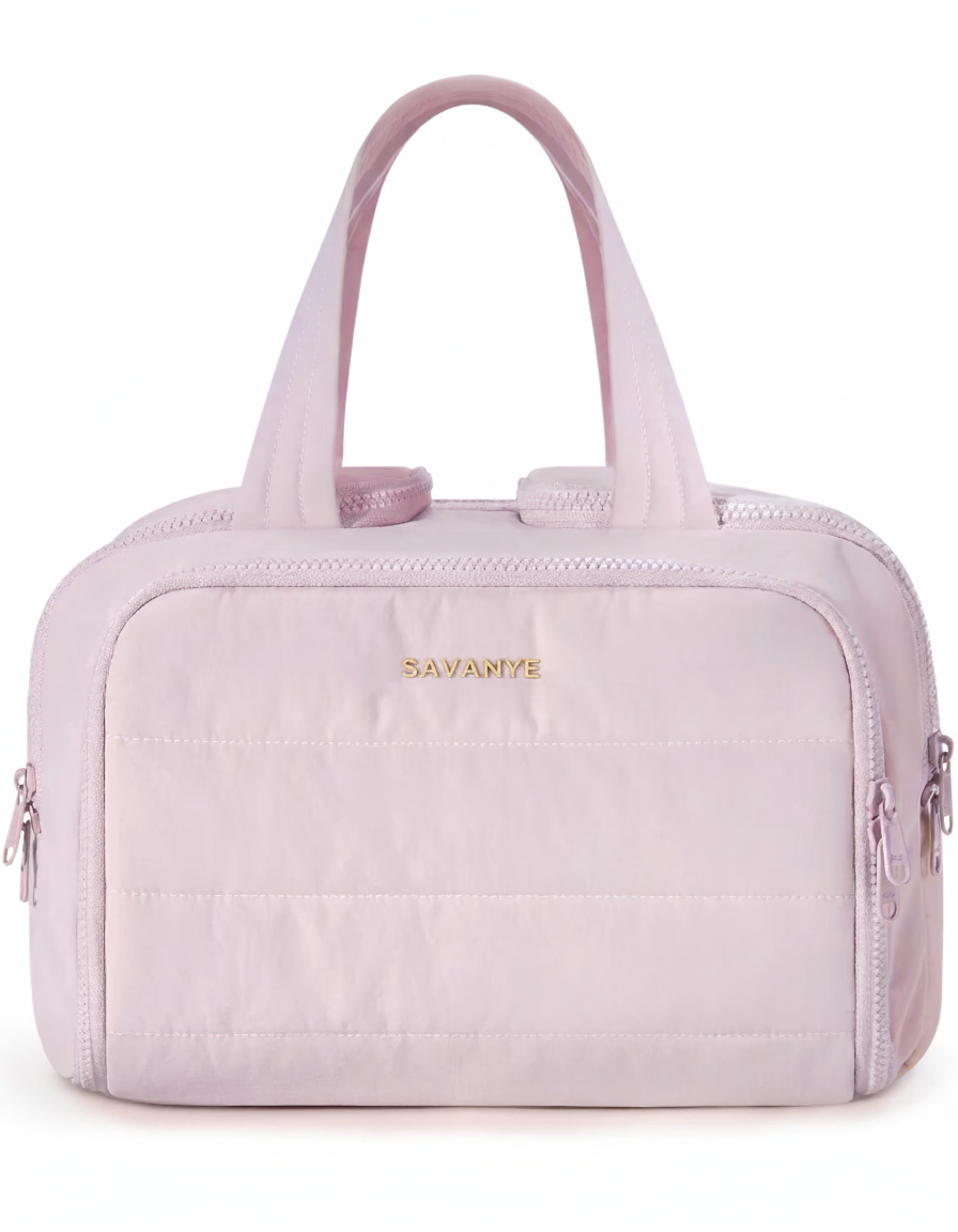 Pink handbag with 'Savane' branding on a white background